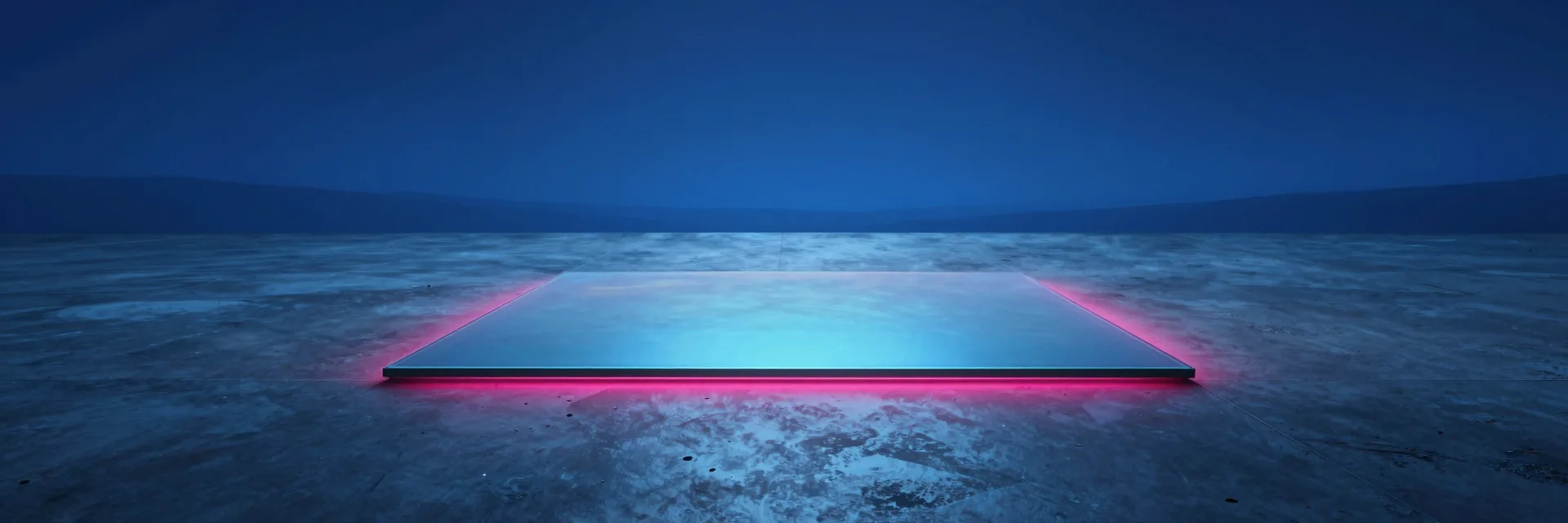 ultra-wide strip of iridescent glass form on dark polished stone with electric-blue and hot-pink refraction - hero image for the Shopify Plus checkout extensions guide